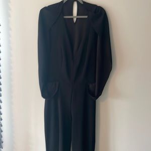Fashion to Figure 1 black jumpsuit with unique cape design deep v neck